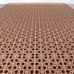 CNC jali cutting design on a façade of AIHP Palms in Gurgaon