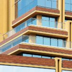 Exterior wooden textured ACP sheet application in balcony of a building in Ahmedabad