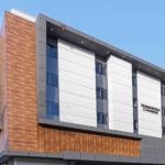 Exterior ACP cladding at DANDE Hospital using Wooden ACP sheets
